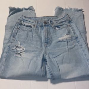 Distressed American Eagle raw hem light wash jeans size 0